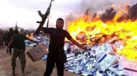 Iraq-militanti-Isis-fuoco-sigarette